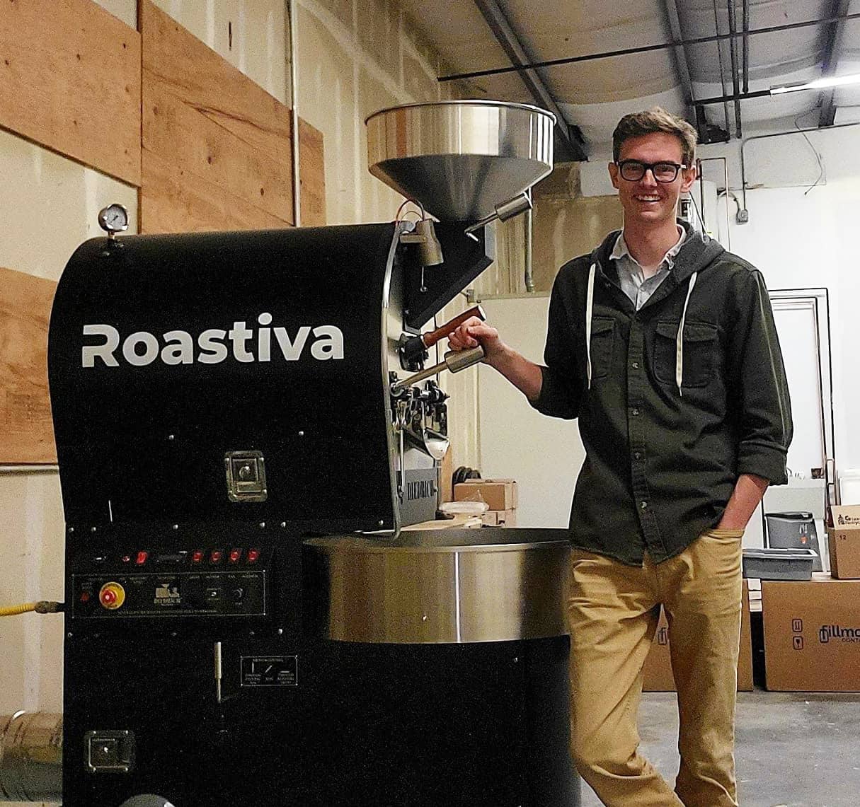 Josiah Abshear beside the Roastiva roaster